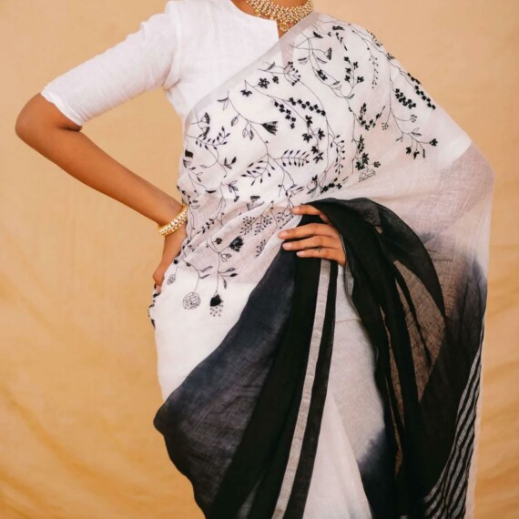 http://www.rivierafashion.in/products/linen-french-knot-hand-embroidery-saree-1