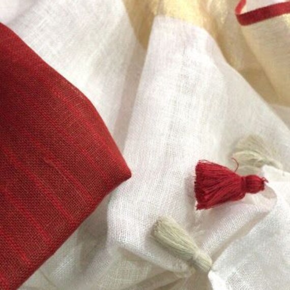 http://www.rivierafashion.in/products/handwoven-pure-linen-saree-4